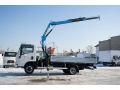 Компания «РусТрак» выпустила Isuzu NMR85LH с КМУ ИНМАН ИМ 25