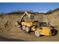 Caterpillar представила три новых самосвала с шарнирно-сочлененной рамой