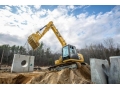 Экскаватор с интеллектуальной гидравликой выпустила компания Caterpillar