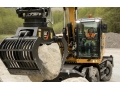 Голландская компания STC BV доработала колесный экскаватор Cat M318F